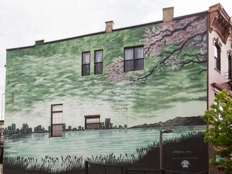 Jersey City Mural on Newark Avenue titled Cherry Blossoms and Train Tracks by Blair Urban