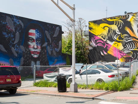 Jersey City Mural on Tonnelle Avenue titled Pursuit of Libery by Shaun Edwards aka Pawn